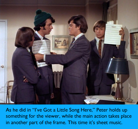 peter-holding-something